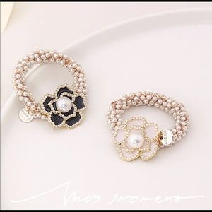 Brand new camellia flower hair tie